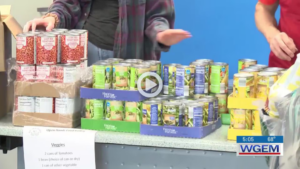 A table of canned goods to be given away.